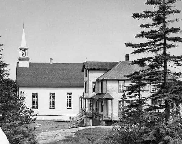 Chapel and mission building beneath the trees