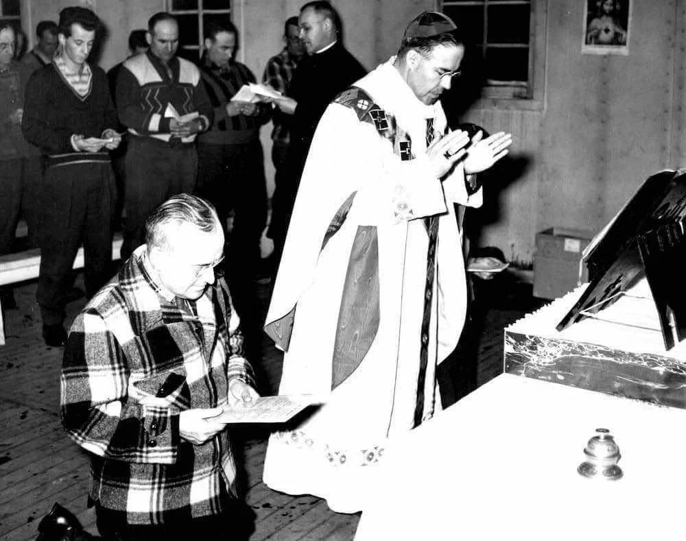 Bishop Couturier celebrates Mass in the camp chapel